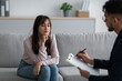 © Prostock-studio - Upset middle eastern woman having session at psychologist's office, talking to professional psychiatrist