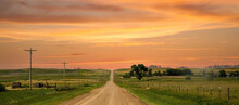 A County Gravel Road Runs Through Farm Land In North Eastern Colorado East Of Sterling