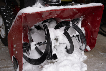 snow blower is full of snow after clearing your driveway