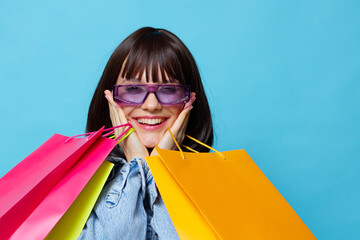 portrait woman in sunglasses shopping emotions posing joy cropped view