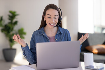 Sticker - Caucasian woman at home remote working on laptop computer talking to her colleague