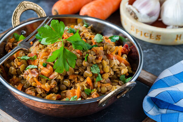 Sticker - Green lentils stew with white wine, Serrano ham and smoked paprika