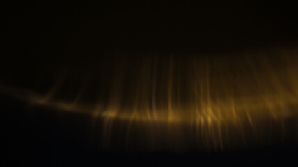 Golden bokeh crystal abstract light rays background, shiny flare texture photo overlay optical lens prism reflection. Use screen overlay mode.