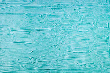 Blue paint texture on a canvas surface, as a background