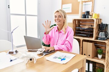 Sticker - Young caucasian woman working at the office showing and pointing up with fingers number five while smiling confident and happy.