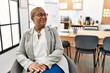 Senior african american woman business worker smiling confident at office