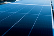 Solar cell Alternative Energy Install at factory roof top Solar panels and Power Station ,Close up view of the roof of a large building with solar panels.