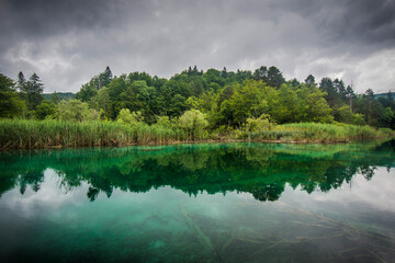 Wall Mural - Plitvice Lakes National Park colorful landscape with turquoise blue and green water in Croatia.