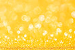 Leinwandbild Motiv sparkles of yellow glitter abstract background. Copy space