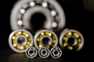 Sticker - A row of ball bearings on a dark background