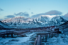 Landscape With Mountains And Sky.
The Collective Heating Pipes Are Insulated From The Ground To Protect The Permafrost