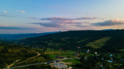 Canvas Print - Mountains forest at sunset top view