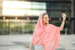© PintoArt - mature woman with pink headscarf fighting cancer, world breast cancer day