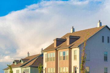 Two houses with dormer roofs at Daybreak in South Jordan, Utah