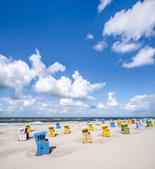 Wall Mural - colorful beach chairs on langeoog island, north sea coast, germany
