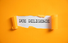 Due Diligence Text On Torn Paper