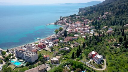 Wall Mural - Aerial drone video of Benitses resort village on Corfu Island, Greece