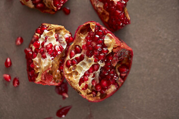 Wall Mural - Pomegranate seeds on marble background 