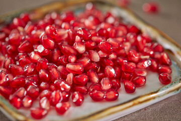 Canvas Print - pomegranate seeds on a plate