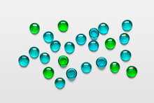 Beautiful Turquoise And Green Glass Beads On A Light Gray Background