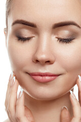 Poster - Beautiful Young Woman with Clean Fresh Skin touch own face . Facial treatment. Beauty and spa . Skin Care. Cosmetics.