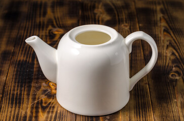 White empty porcelain teapot.