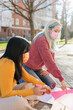 © Sangiao_Photography - group of multicultural women prepare banner for 8 march break the bias womens international day