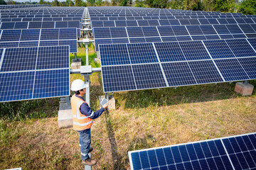 The solar farm(solar panel) with engineers check the operation of the system, Alternative energy to conserve the world's energy, Photovoltaic module idea for clean energy production