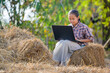Asian girls living in rural areas and schools in rural Thailand are happy to sit and watch laptops for education and study online using their laptops.