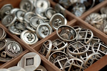 Metal sewing buttons in the assortment. Tailoring.