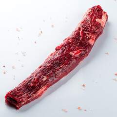 Wall Mural - Fresh and raw beef meat. Whole piece of tenderloin ready to cook on white background