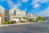 Fototapeta Mapy - Duplex houses with green wood vinyl sidings at Carlsbad, San Diego, California