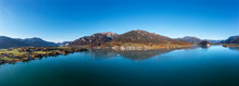 Austria, Salzburg, Sankt Wolfgang Im Salzkammergut, Drone Panorama Of Lake Wolfgang With Schafberg Mountain In Background