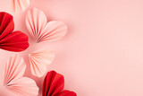 Fototapeta Mapy - Fun Valentines day festive background in asian style - pink and red paper hearts of folded fans soar on gentle pastel pink color backdrop, top view, copy space, closeup.