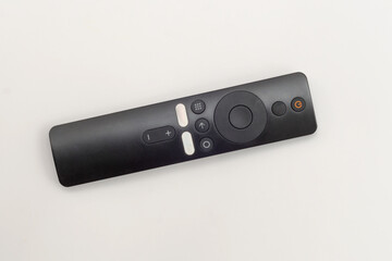 black remote control tv box on white background