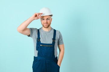 Wall Mural - Close-up portrait of his he nice attractive cheerful cheery content guy repairer craftsman isolated over blue color background.