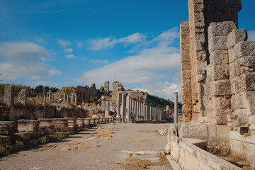 Wall Mural - Agora columns with great sky viewin Perge or Perga ancient Greek city - once capital of Pamphylia in Antalya Turkey on warm October afternoon.