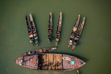 Aerial View Of Long Canoes Used For Construction Works Along Kynshi River Near Tahirpur, Sylhet, Bangladesh.