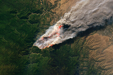 a flattering fire from space. elements of this image were furnished by nasa