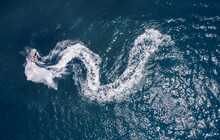 Aerial View Of A Motorboat Sailing In Open Water In Acre, Northern District, Israel.