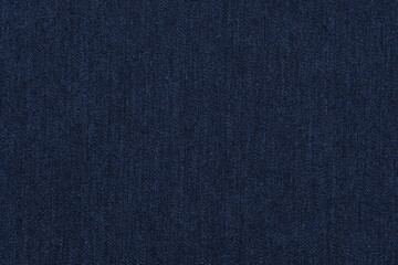 blue jeans texture. dark blue denim background.