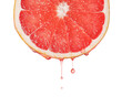 © Dago Martinez - Red grapefruit essential oil dripping. Fresh citrus slice dripping with juice or oil serum ingredient. Seed oil extract.