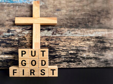 Religion Concept - Put GOD First Text In Vintage Background.Stock Photo.