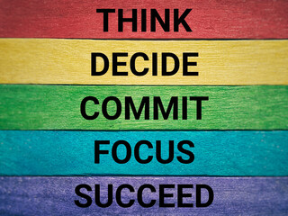 Wall Mural - Inspirational and Motivational Concept - THINK DECIDE COMMIT FOCUS SUCCEED text background. Stock photo.