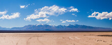 Dry River Bed During A Drought At El Barreal Blanco De La Pampa Del Leoncito, San Juan Province, Argentina, South America, Background With Copy Space