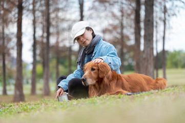 Sticker - Golden Retriever accompanies owner on grass in park