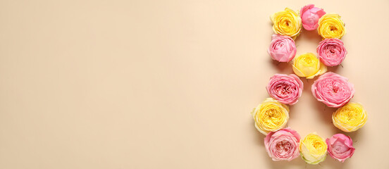 Figure 8 made of beautiful rose flowers on color background with space for text