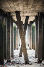 Underside Of A Pier On The Banks Of The River Thames, South Bank, London, England
