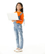Cutout isolated studio shot of Asian young cute girl in casual orange party costume standing holding hand up say hi greeting on video call via laptop computer on white background.