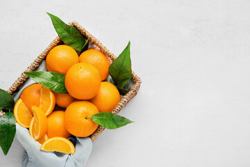 Wall Mural - Box with fresh juicy oranges on white background